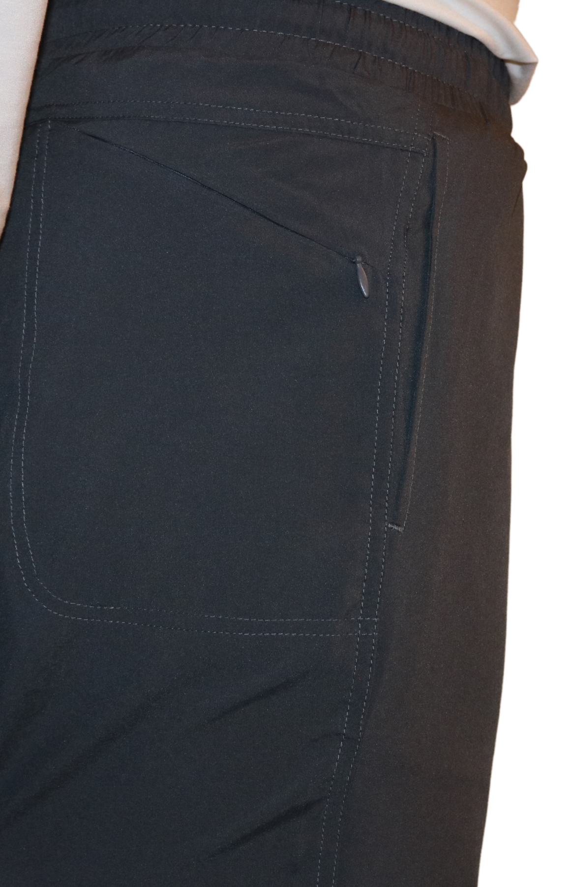 Back zipper pocket of the Bamboo Lined Sabalo Fishing Shorts. These fishing shorts are perfect for long days on the water.