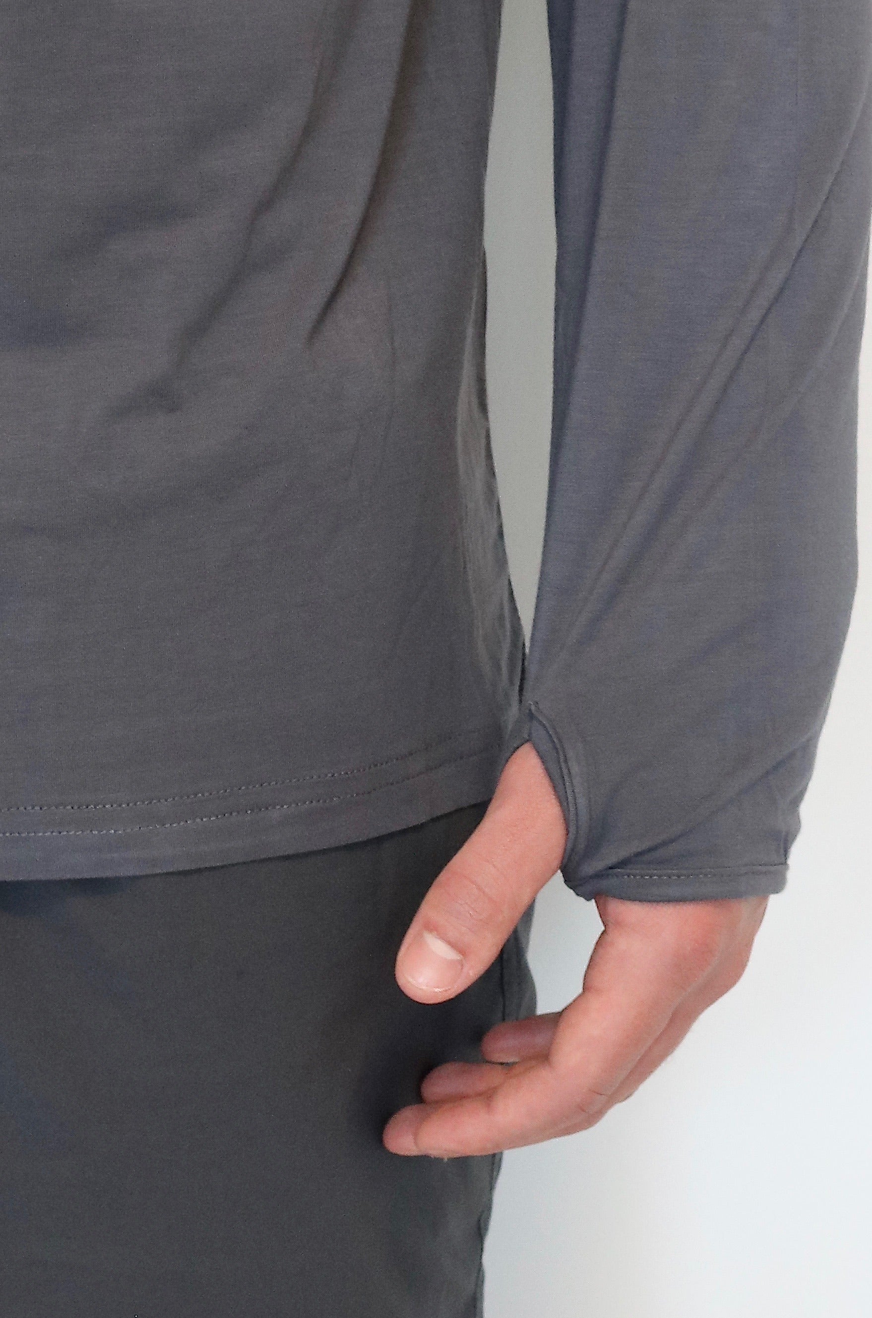 Thumbhole of the Angler Crossover Bamboo Hoodie in Charcoal. This sun hoodie provides great sun coverage.