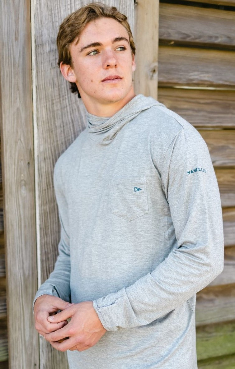 Model wearing the Angler Crossover hoodie in Heather Grey.