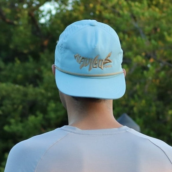 Model in the Light Blue Performance Rope Cap.