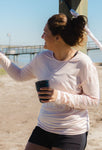 Model wearing the Women's Lightweight Long Sleeve shirt in Pink.