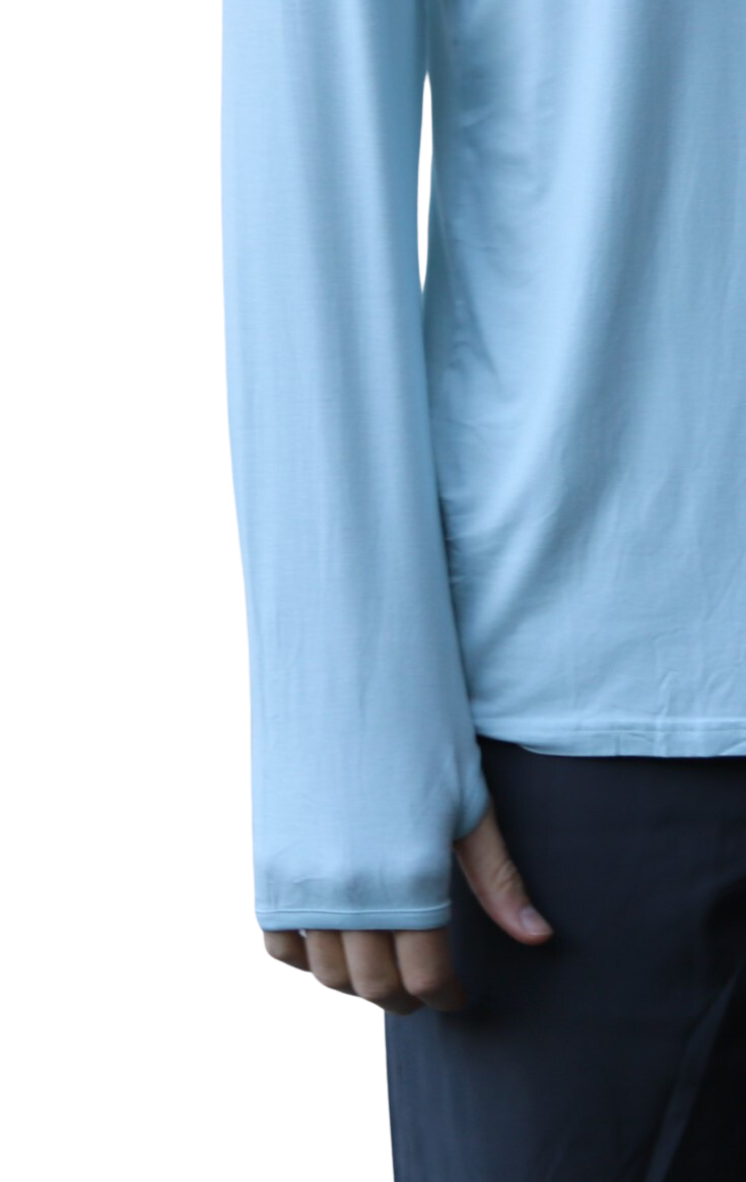 Thumbholes of the Lightweight Classic Fly Hoodie in Breezy Blue.