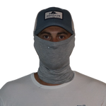 Model wearing the Bamboo Neck Gaiter in Heather Grey. This fishing buff provides 35+ UPF sun protection.