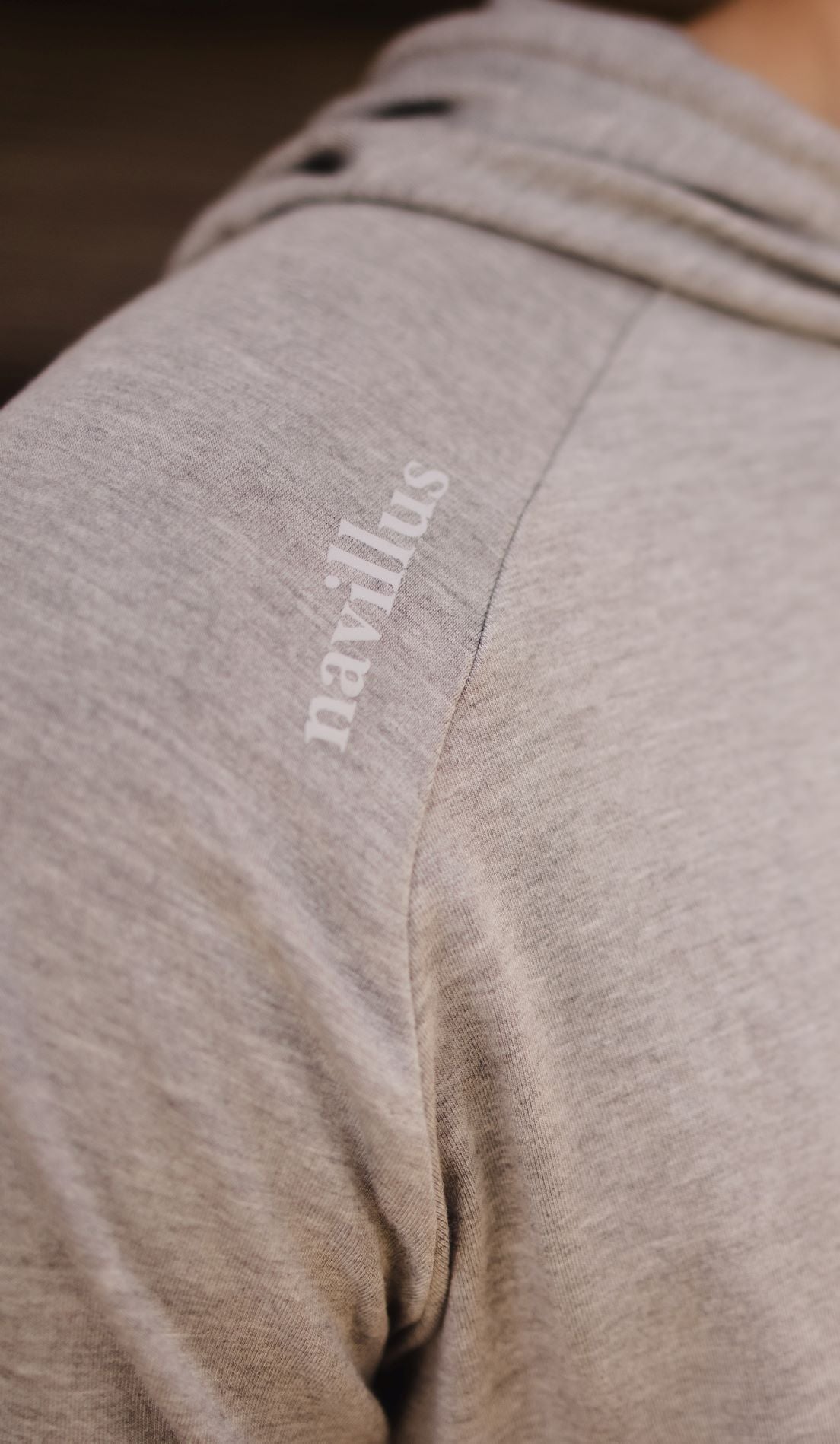 Front logo of the Cruiser Midweight Bamboo Hoodie in Heather Grey.