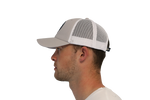 Model wearing the Classic Logo Snapback fishing cap. This fishing trucker cap has a mesh back.