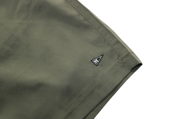 Side logo of the Bamboo Lined Sabalo Fishing Shorts. These fishing shorts are perfect for long days on the water.